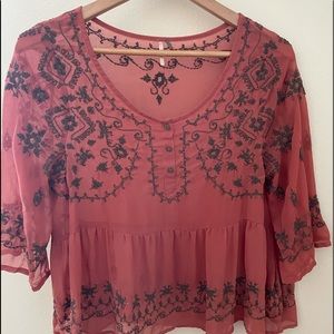 Free People boho top. Terra cotta with gray embroidery.